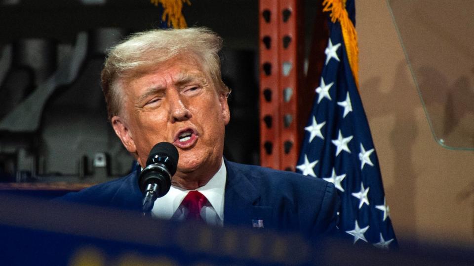 PHOTO: Former President and 2024 presidential hopeful Donald Trump speaks at Drake Enterprises, an automotive parts manufacturer and supplier, in Clinton, Michigan, on Sept. 27, 2023. (Matthew Hatcher/AFP via Getty Images)