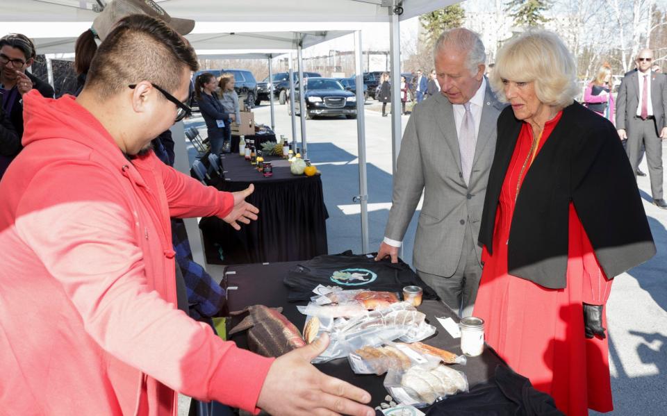 The Prince of Wales and the Duchess of Cornwall visited a market in Yellowknife - GETTY IMAGES