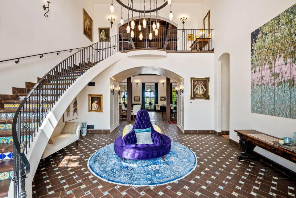 A 10,000-square-foot Spanish Colonial Revival home on 108 acres in Templeton features an impressive foyer, staircase and balcony.
