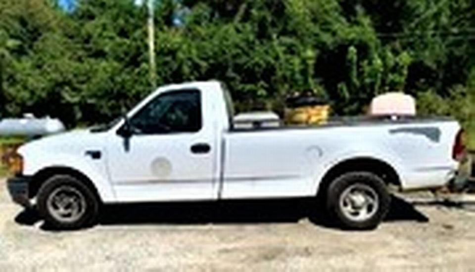 A white Ford F-150 pickup truck with a City of Forsyth emblem on its doors was allegedly stolen by an inmate on a work detail Monday morning, officials said.