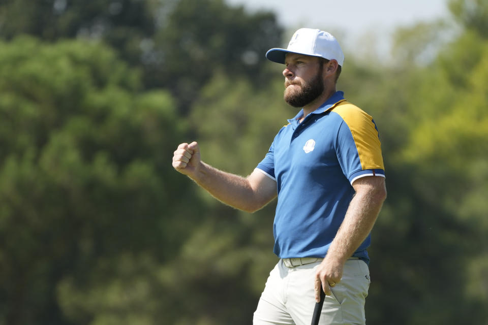 Europe's Tyrrell Hatton celebrates on the 6th green after putting during his singles match at the Ryder Cup golf tournament at the Marco Simone Golf Club in Guidonia Montecelio, Italy, Sunday, Oct. 1, 2023. (AP Photo/Gregorio Borgia)