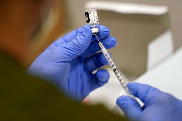 PHOTO: FILE -A healthcare worker fills a syringe with the Pfizer COVID-19 vaccine at Jackson Memorial Hospital, Oct. 5, 2021, in Miami. (Lynne Sladky/AP)