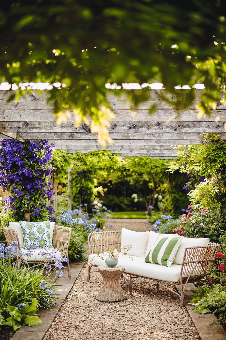 Create a seating area under a pergola