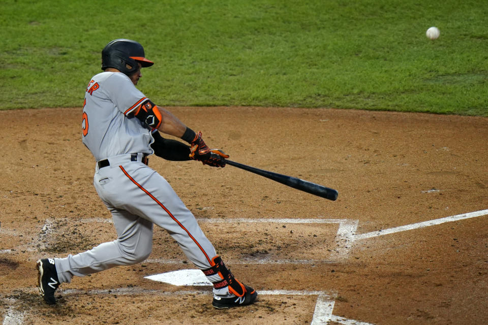 Baltimore Orioles' Anthony Santander hits a home run off Philadelphia Phillies pitcher Zach Eflin during the third inning of a baseball game, Wednesday, Aug. 12, 2020, in Philadelphia. (AP Photo/Matt Slocum)