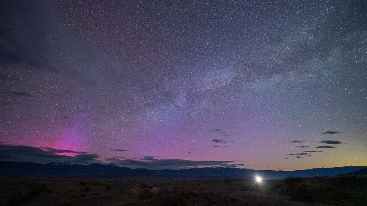  Purple aurora glow seen above the horizon from California's Death Valley. 