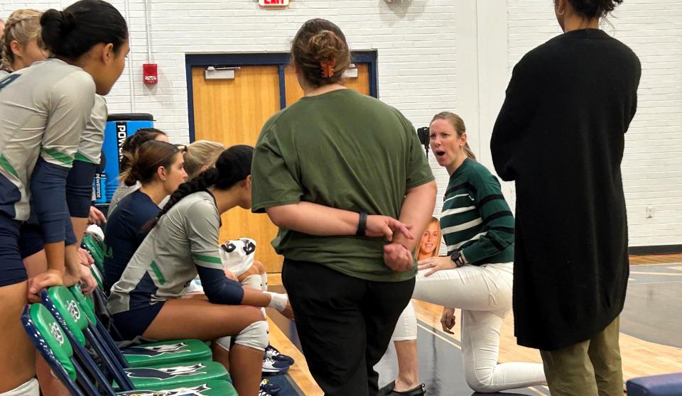 Pensacola State College head coach Patricia Gandolfo talks to her players during a timeout in first set of the Pirates' 3-0 sweep of Palm Beach State College on Saturday, Sept. 30, 2023 from the Ambersley and Levy Court inside Hartsell Arena.