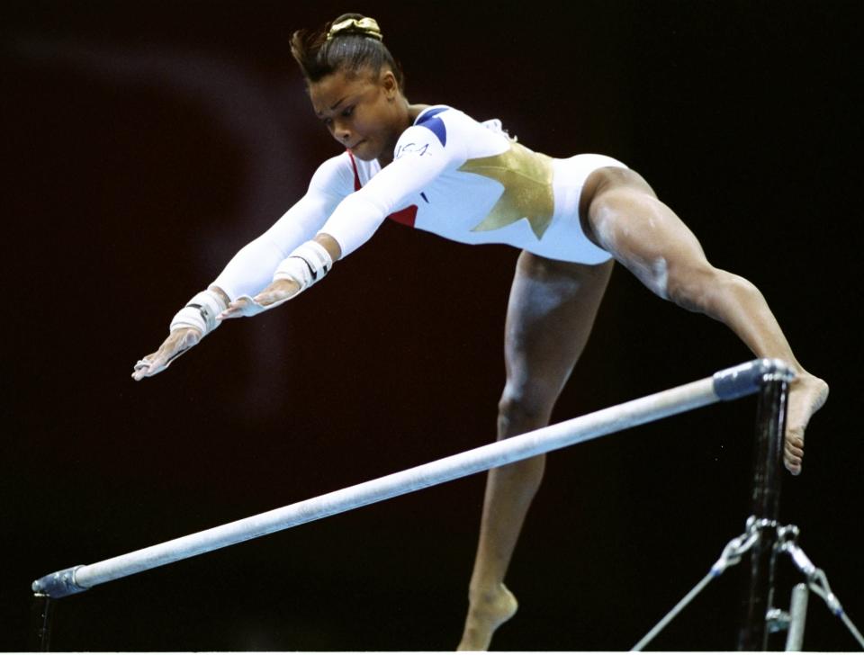 <b>1996 Atlanta Olympics</b><br>25 Jul 1996: Dominique Dawes of the USA in action in the womens individual all around final at the Georgia Dome at the 1996 Centennial Olympic Games in Atlanta Georgia.