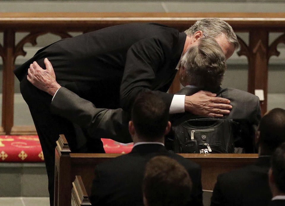 <p>Former Florida Governor Jeb Bush comforts his father, former President George H.W. Bush during a funeral service for his mother, former first lady Barbara Bush at St. Martin’s Episcopal Church, Saturday, April 21, 2018, in Houston. (Photo: David J. Phillip, Pool/AP) </p>