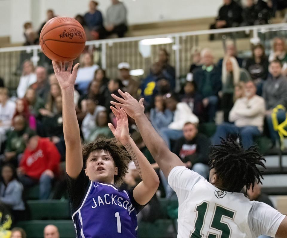 Jackson’s Cam Weekley shoots during a game against GlenOak in February.
