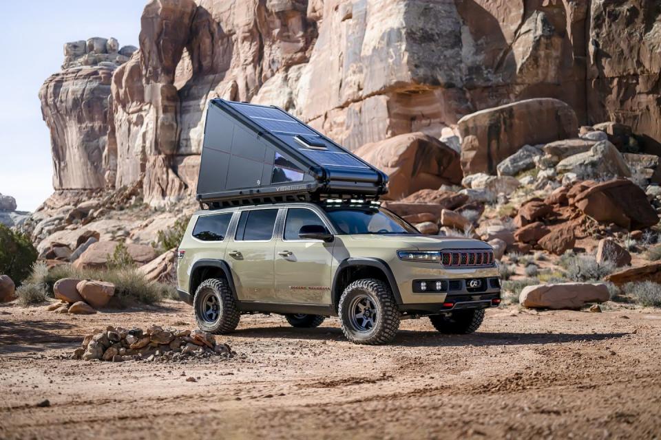 <p>The tent on top of the Grand Wagoneer is a custom carbon-fiber structure called the RedTail Overland Skyloft. Not only can it be assembled in mere seconds by hand, but it's also climate-controlled and can sleep two people. Jeep says it also turned the Wagoneer's rearmost sunroof into a porthole to access the roof-mounted tent.</p>