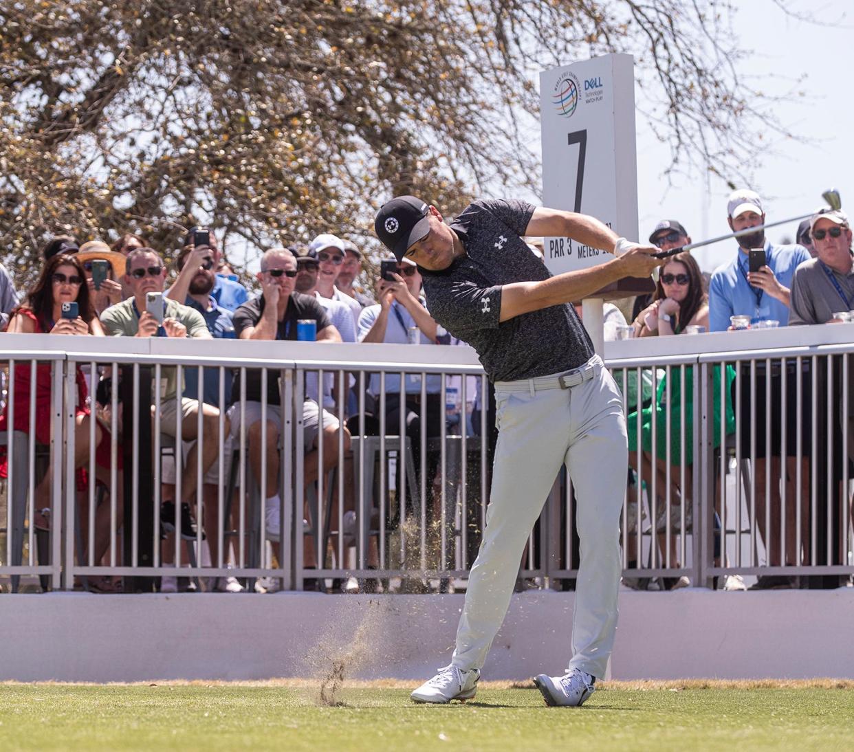 Spectators watch as Jordan Spieth hits a tee shot during this year's WGC-Dell Technologies Match Play tournament. On Wednesday, the PGA Tour announced the competition's purse from 2023 will grow from $12 million to $20 million.