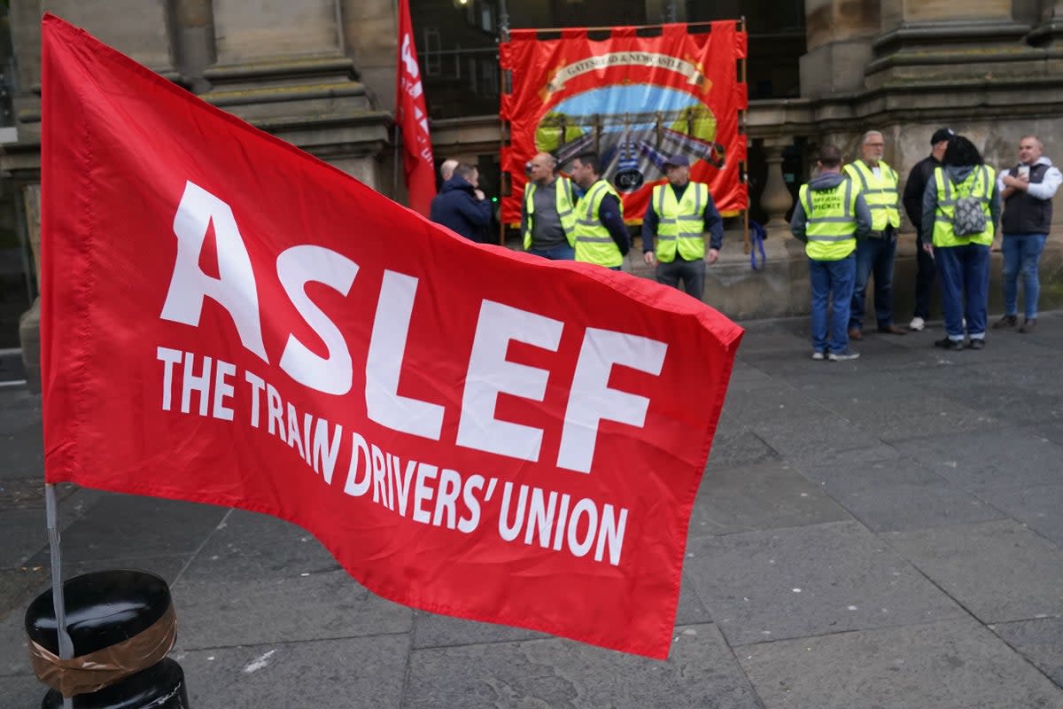 Members of the drivers’ union Aslef (Owen Humphreys/PA) (PA Wire)