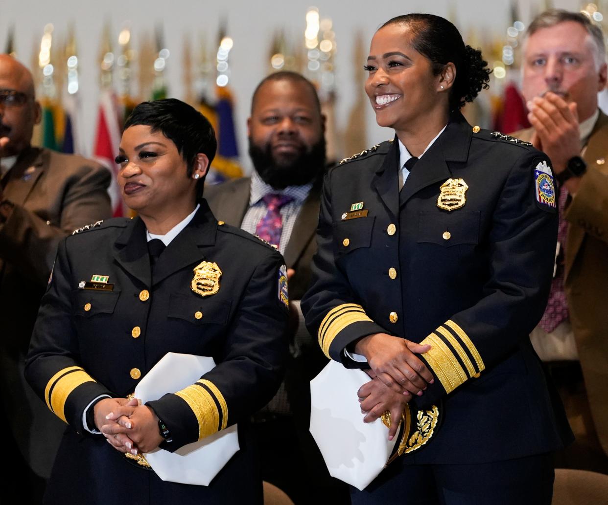 Columbus police Chief Elaine Bryant, right, and First Assistant Chief LaShanna Potts, left, are recognized at their ceremonial swearing-in April 5 after completion of their Ohio Peace Officers Training at the James G. Jackson Columbus Police Academy. Bryant was named chief in June 2021 and Potts joined her later that year.