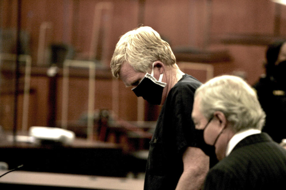 Alec Murdaugh awaits the beginning of his bond hearing in the Richland Judicial Center in Columbia, S.C., Tuesday, Oct. 19, 2021. A judge in South Carolina denied bond for attorney Alex Murdaugh on the second set of charges he has faced since finding his wife and son dead last June. (AP Photo/Lewis M. Levine, Pool)