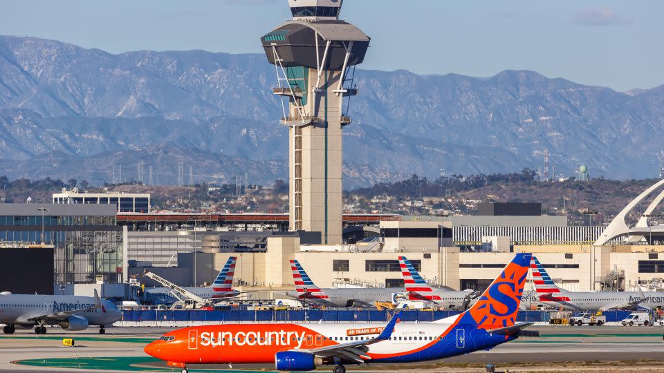 The air traffic control tower at Los Angeles International Airport is a busy place. The United States is still short thousands of air traffic control personnel. - Markus Mainka/imageBROKER/Shutterstock