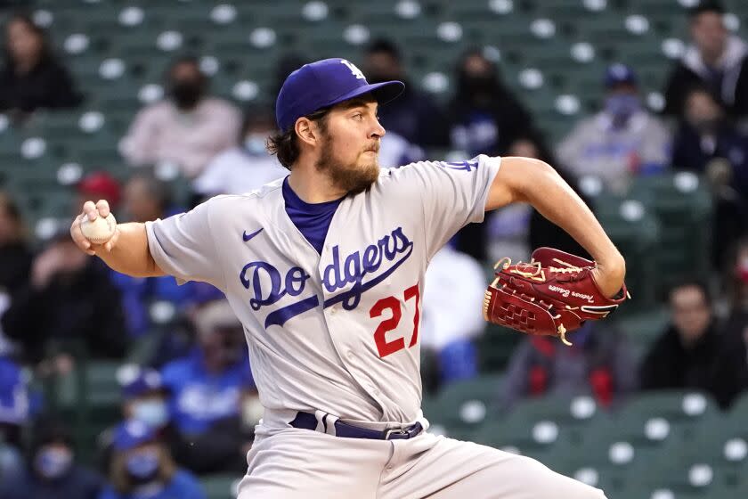 Dodgers starting pitcher Trevor Bauer delivers during the first inning of a baseball game against the Chicago Cubs.