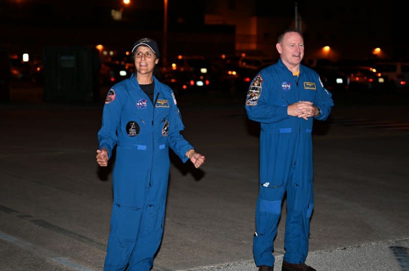 NASA astronauts and crew members Suni Williams and Butch Wilmore are on hand as Boeing rolls out its Starliner spacecraft from the Commercial Crew and Cargo Processing Facility at the Kennedy Space Center in Florida on Tuesday. Photo by Joe Marino/UPI