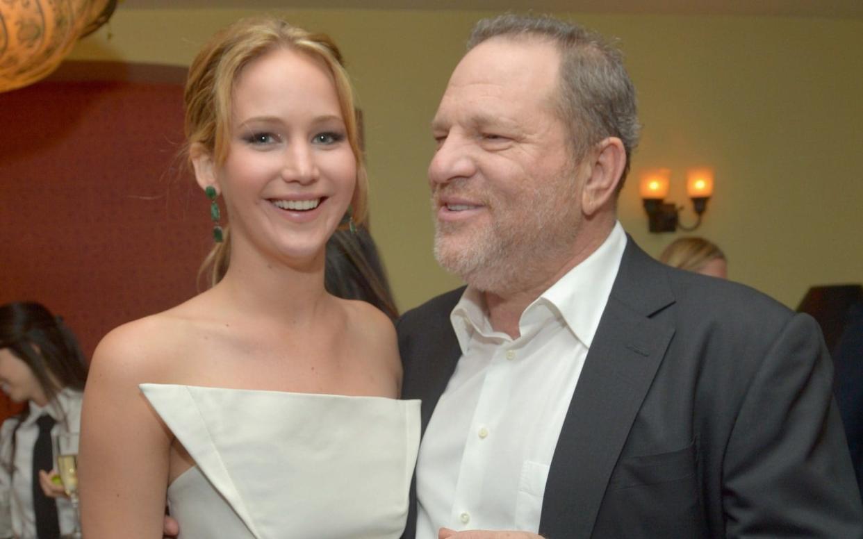 Jennifer Lawrence, pictured with Harvey Weinstein in 2013 - Getty Images North America