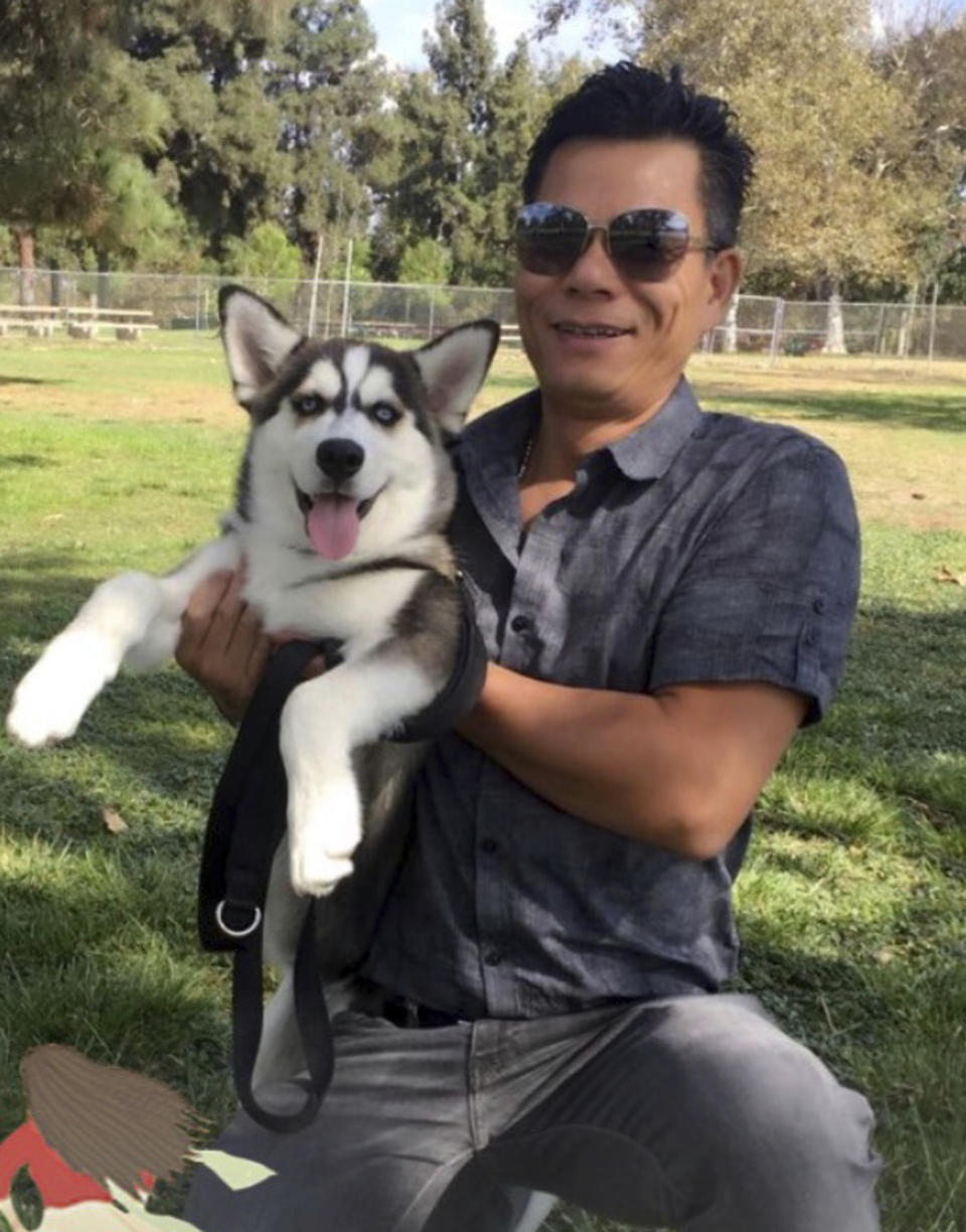 This undated family photo provided by the Cochran Firm shows Chinese immigrant Li Xi Wang at an unknown location. Wang, fatally shot by a Southern California police officer as he hid behind a door during a raid on a marijuana growing operation, didn’t speak English and likely didn't understand he was being told to show his hands, lawyers for the man’s family said Wednesday, Aug. 28, 2019, in alleging the officer had no reason to open fire. (Wang Family via AP)