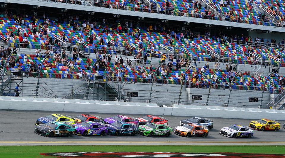 Austin Dillon (3) leads the pack to a restart during the Coke Zero Sugar 400 at Daytona International Speedway on Aug. 28, 2022.