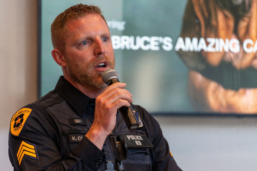 A photo of the SLCPD K9 Squad’s sergeant talking about K9 Bruce (SLCPD photo – April 17, 2024).