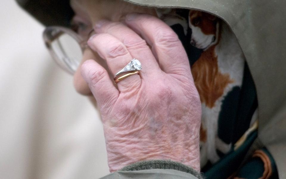 The Queen wearing her diamond engagement ring and Welsh-gold wedding band - Antony Jones/UK Press via Getty Images