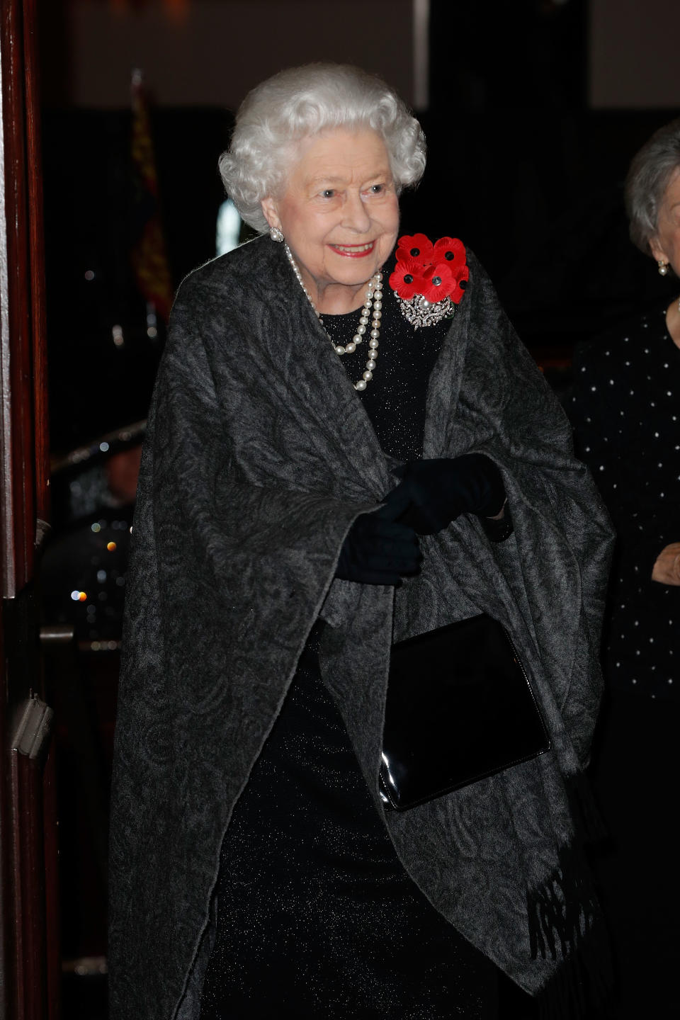 The Queen wore five poppies for the Royal Festival of Remembrance (Getty)