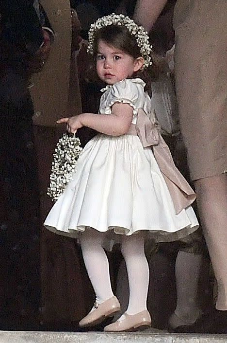 <p>Princess Charlotte as a bridesmaid in her Aunt Pippa's wedding.</p>