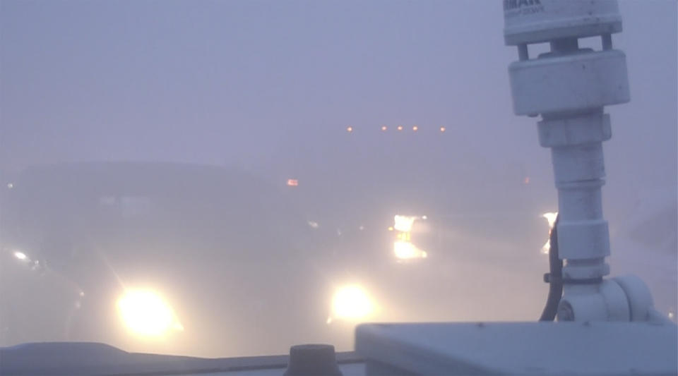 Traffic is at a standstill as a mixture of smoke and fog, known as "super fog" closed Interstate 10 in Louisiana on Tuesday, Nov. 7, 2023. New Orleans police say a stretch of the interstate is closed Tuesday due to the smoke, fog and vehicle crashes. The closure is reminiscent of a super fog event on October 23, when seven people died and about two dozen were injured in pileups involving about 160 vehicles on Interstate 55. (WVUE via AP)