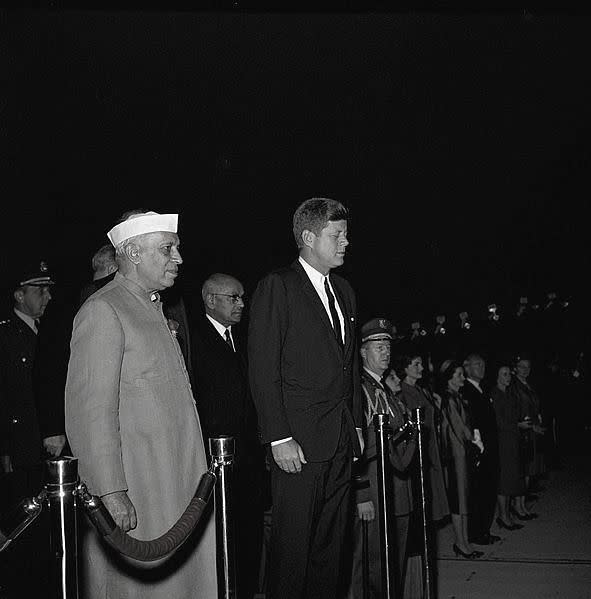 PM Jawaharlal Nehru and President John F. Kennedy participate in arrival ceremonies for Nehru; 6 November 1961.