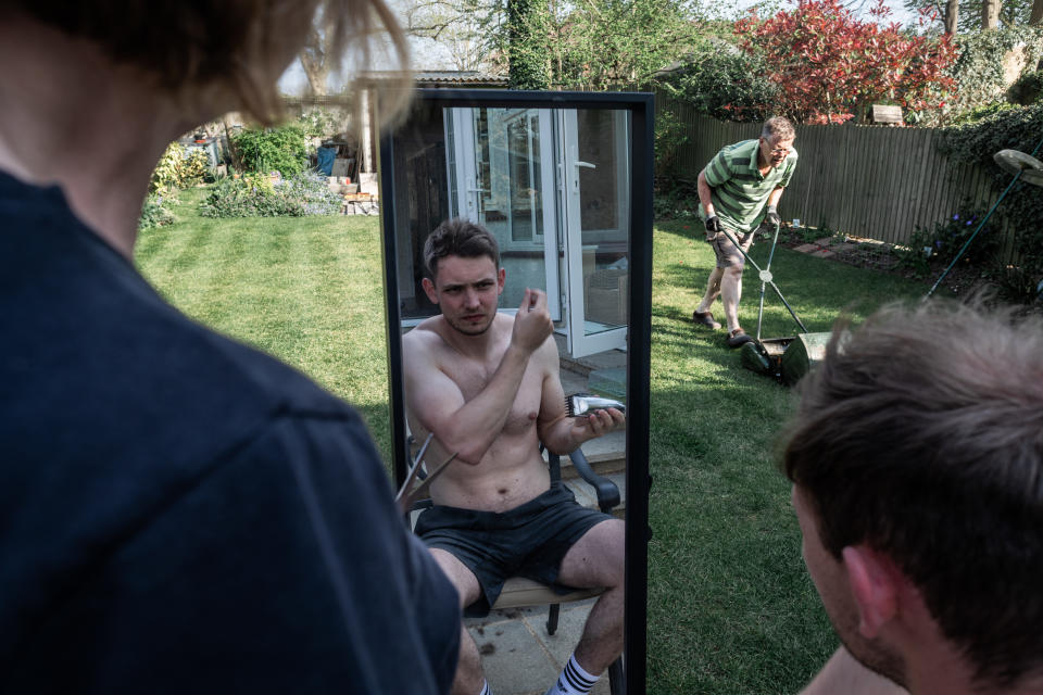 A lockdown haircut in a garden in Chatham, Kent (Rory Milner/Historic England/PA)
