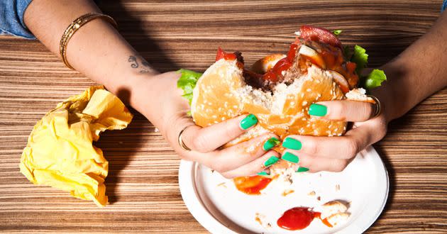 Times of stress can make junk food seem irresistible, new research has revealed. Photo: Getty