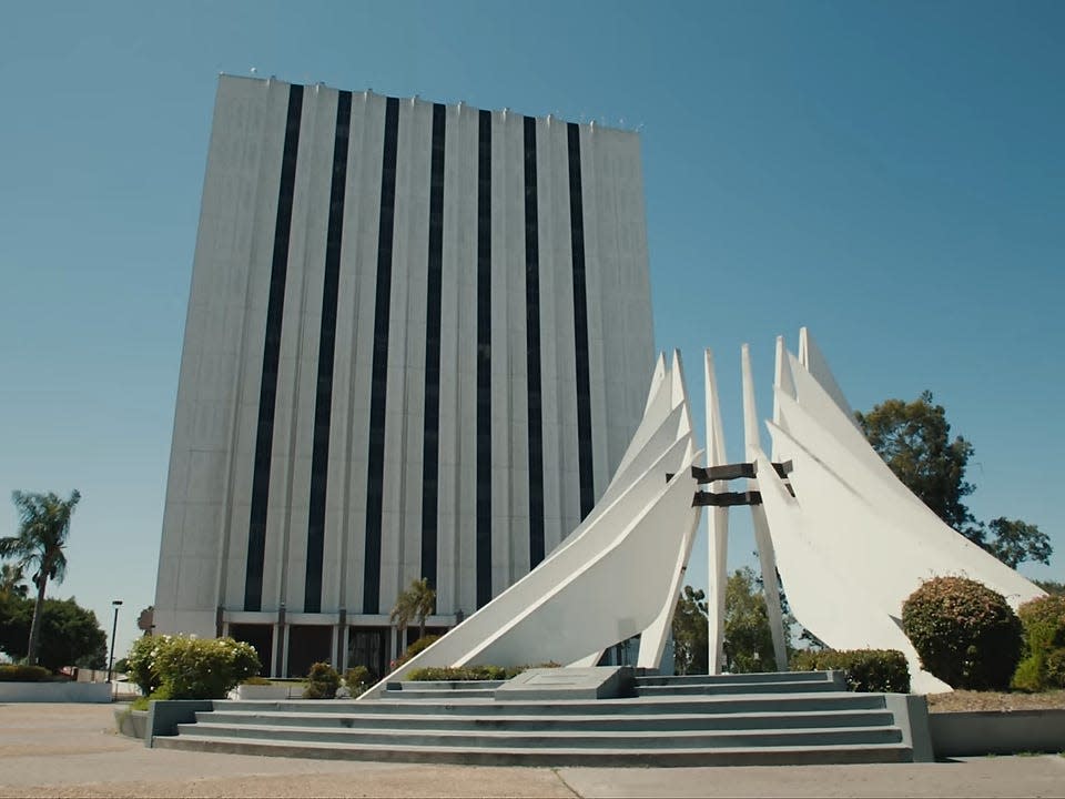 A screengrab from the "Not Like Us" music video featuring the Compton Courthouse in Los Angeles.