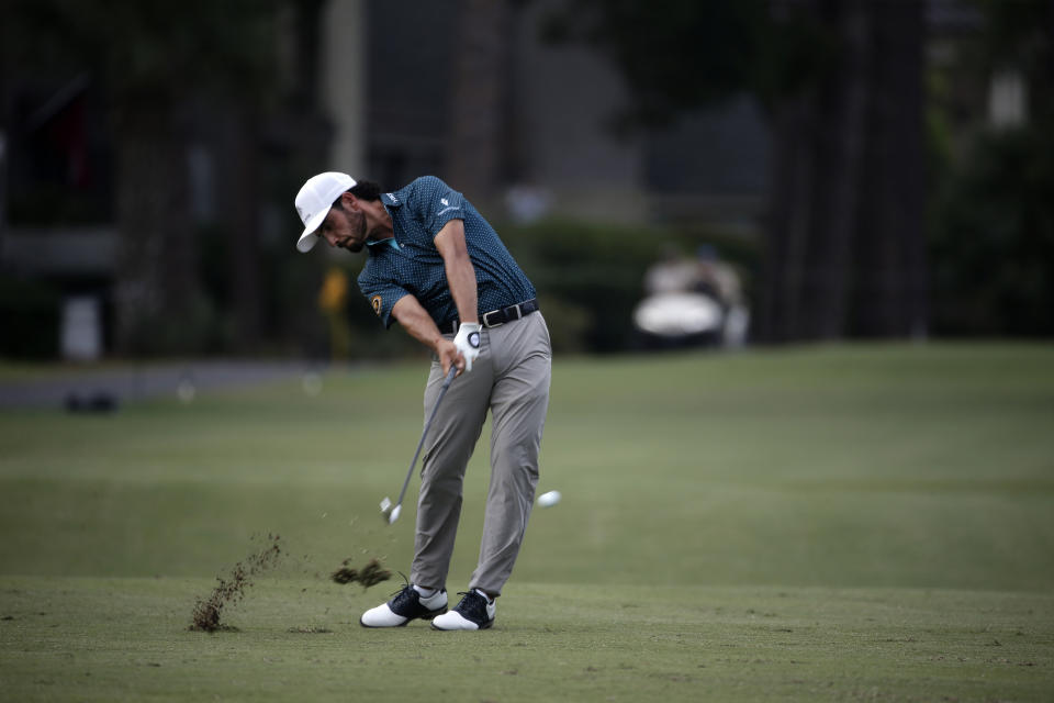 Abraham Ancer of Mexico hits on the 10th fairway during the final round of the RBC Heritage golf tournament, Sunday, June 21, 2020, in Hilton Head Island, S.C. (AP Photo/Gerry Broome)