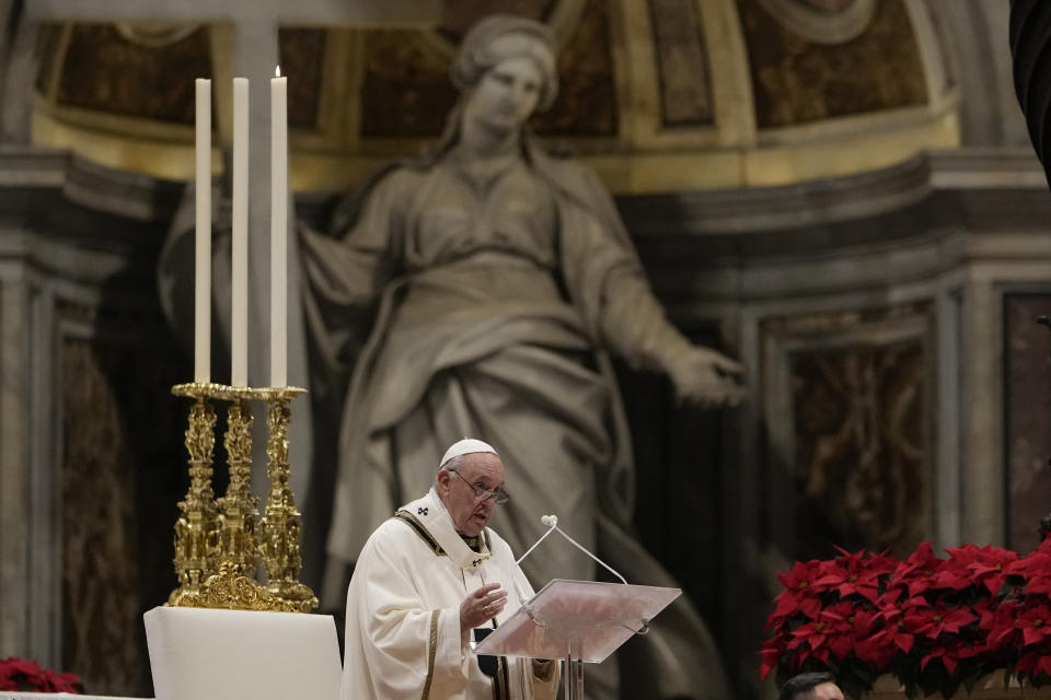 Pope Francis celebrates Christmas Eve Mass, at St. Peter's Basilica, at the Vatican, Friday Dec. 24, 2021. Pope Francis is celebrating Christmas Eve Mass before an estimated 1,500 people in St. Peter's Basilica. He's going ahead with the service despite the resurgence in COVID-19 cases that has prompted a new vaccine mandate for Vatican employees. (AP Photo/Alessandra Tarantino)