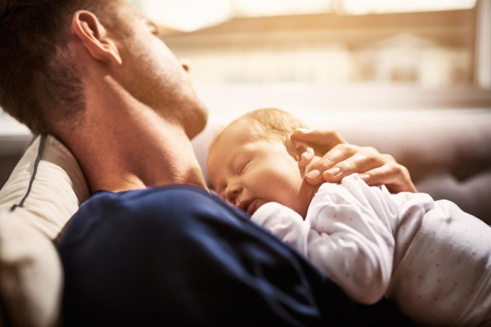 You can tell a new dad from the brand-new crossbody diaper bag being toted around town, but veteran dads say you don’t have to get that fancy. Getty Images