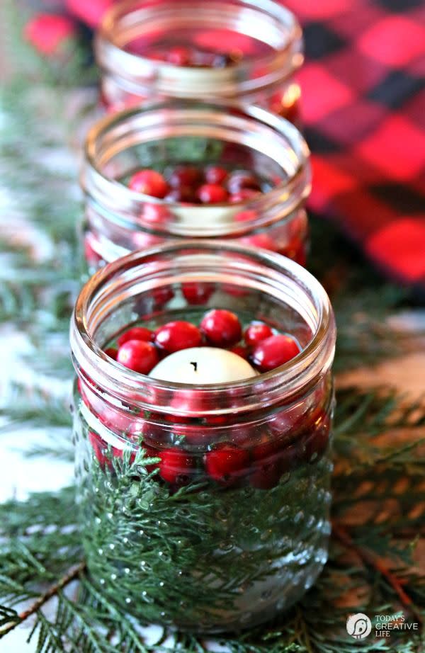 <p>In just five minutes, you can create these stunning luminaries using jars (Mason jars are our pick, but pickle jars work just as well), cranberries, cedar clippings or something green, and floating candles. </p><p><strong>Get the tutorial at <a href="http://todayscreativelife.com/5-minute-diy-christmas-luminaries/" rel="nofollow noopener" target="_blank" data-ylk="slk:Today's Creative Life;elm:context_link;itc:0;sec:content-canvas" class="link ">Today's Creative Life</a>.</strong> </p><p><strong><a class="link " href="https://www.amazon.com/YIH-Unscented-Dripless-Floating-Tealight/dp/B07FCRQ63C/ref=sr_1_5?tag=syn-yahoo-20&ascsubtag=%5Bartid%7C10050.g.644%5Bsrc%7Cyahoo-us" rel="nofollow noopener" target="_blank" data-ylk="slk:Shop Now;elm:context_link;itc:0;sec:content-canvas">Shop Now</a><br></strong></p>
