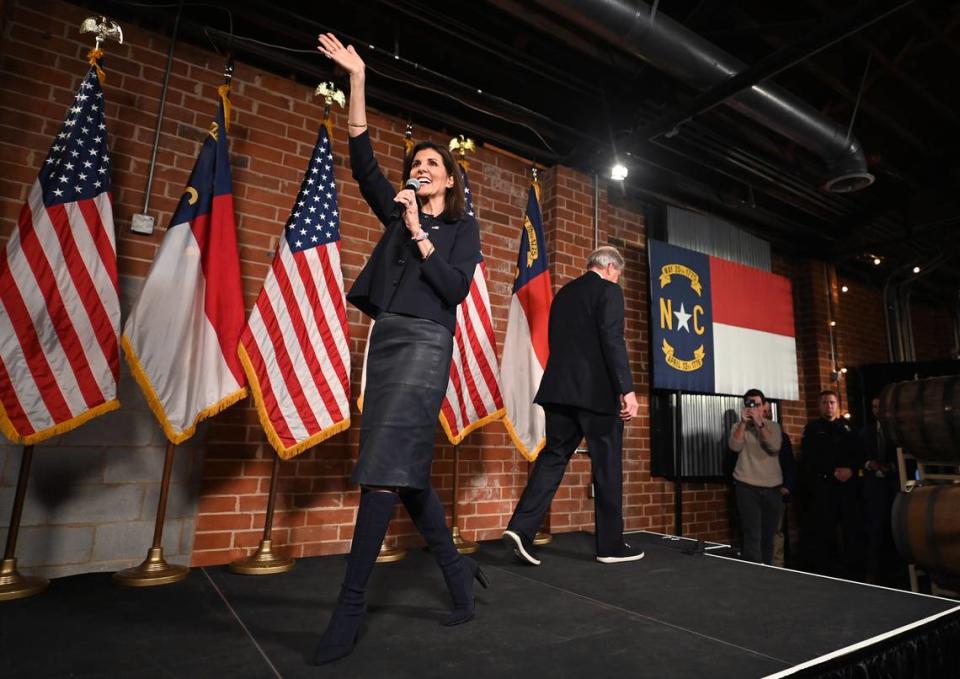 Nikki Haley waves to supporters as she walks onto the stage at Norfolk Hall at Suffolk Punch in SouthEnd on Friday, March 1, 2024 in Charlotte, NC. JEFF SINER/jsiner@charlotteobserver.com