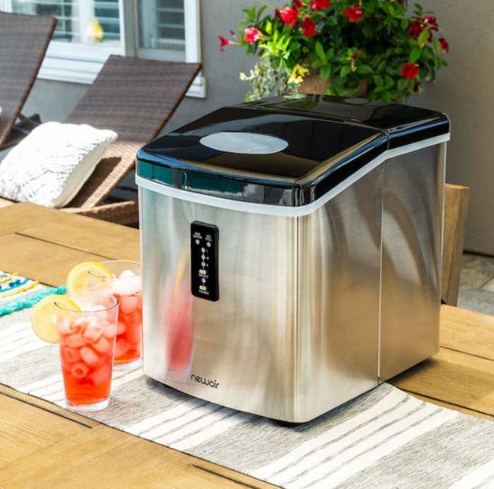 silver ice maker on outdoor table