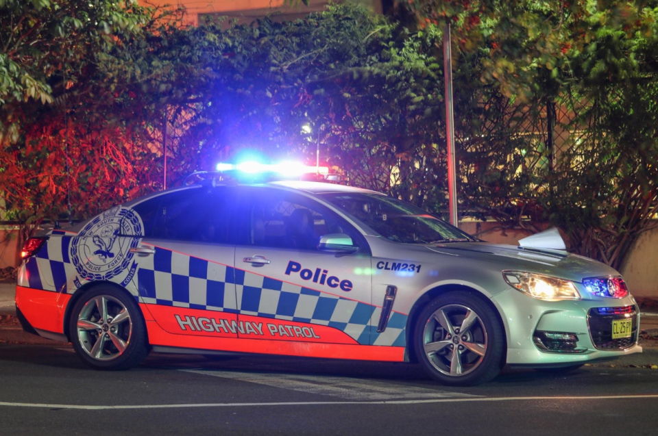 NSW Police have fined a man for having three unrestrained children in his car. Pictured is a stock image of a highway patrol car.