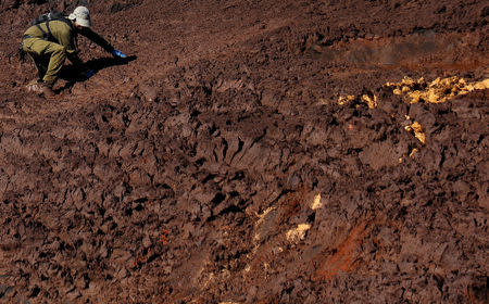 A member of Israeli military searches for victims of a collapsed tailings dam owned by Brazilian mining company Vale SA, in Brumadinho, Brazil January 30, 2019. REUTERS/Adriano Machado