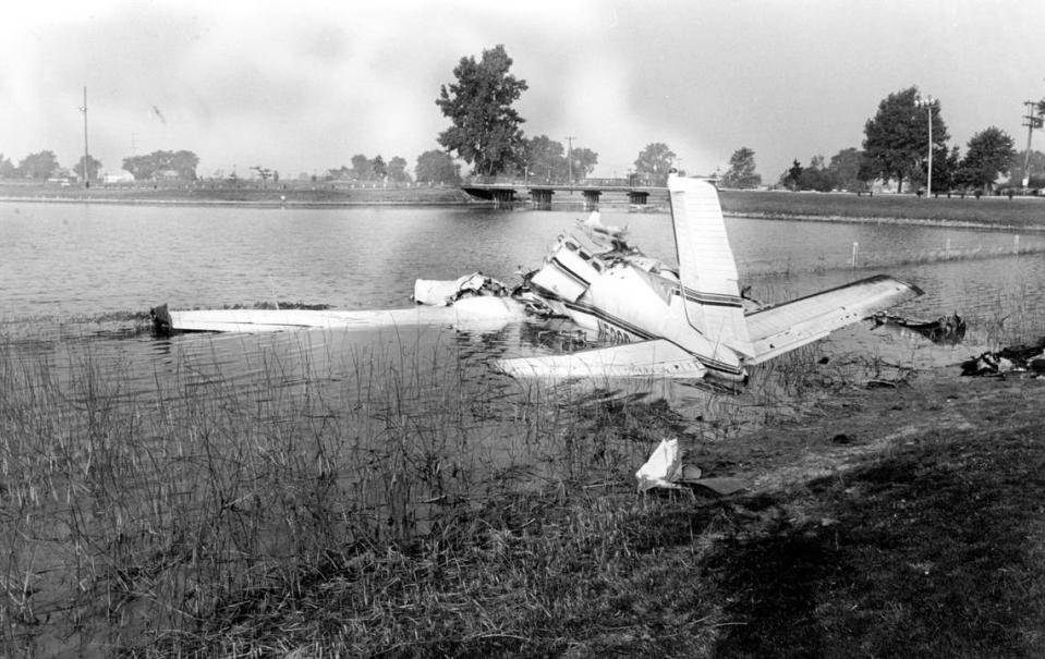 A private twin-engine plane that crash landed on a golf course and bounced into water hazard on the seventh hole at Sportsman’s Club in Lansing, Ill., is shown on July 25, 1966. The plane carrying golfer Tony Lema, his wife and two others crashed July 24 as it was en route to Joliet, Illinois from Akron, Ohio where Lema competed in PGA tournament.