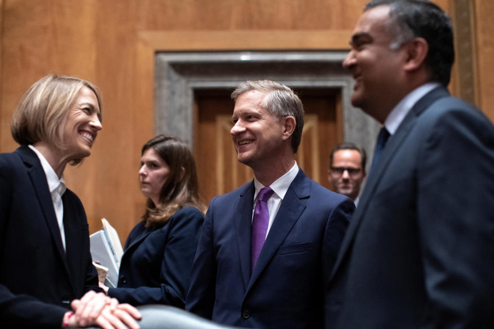 Vanessa Pappas, Chief Operating Officer at TikTok, greets Jay Sullivan, General Manager of Bluebird at Twitter, and Neal Mohan, Chief Product Officer at YouTube, during a hearing before the U.S. Senate Homeland Security and Governmental Affairs Committee on Capitol Hill, in Washington, U.S., September 14, 2022. REUTERS/Tom Brenner