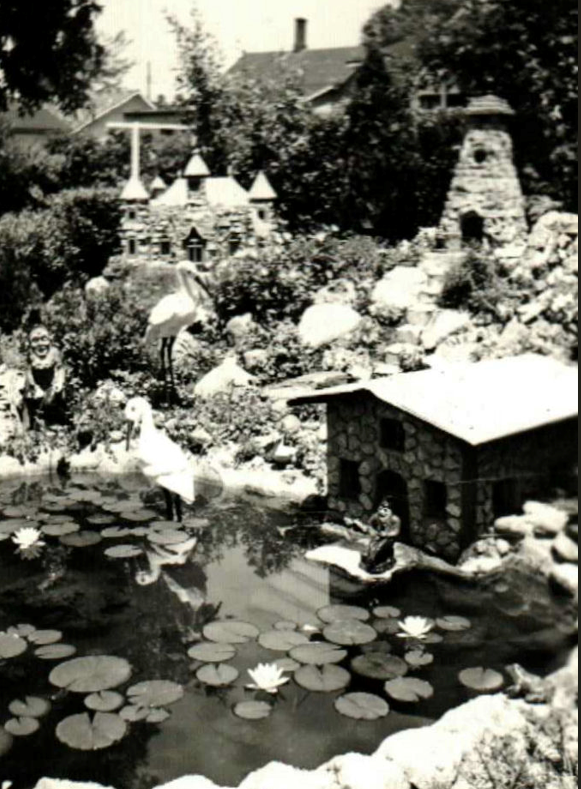 The author's great-grandparents built this backyard garden and pond at 903 Hunt St. in Adrian. Included are a gnome, left, two storks, a troll, lower right, and a fairy-tale castle.  The plants are roses, and there were hundreds of them.