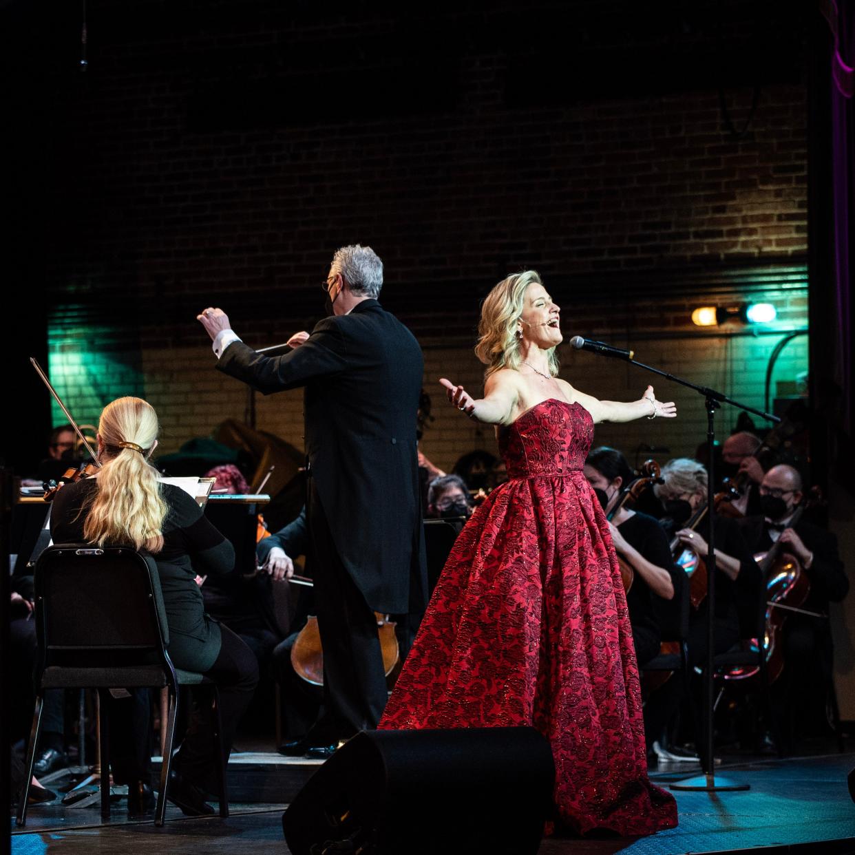 Soloist Lori Kay Harvey sings during a concert with Newark-Granville Symphony Orchestra. Harvey and the symphony orchestra will take The Midland Theatre stage for A Very Merry Holiday Pops! on Sunday, Dec. 3.