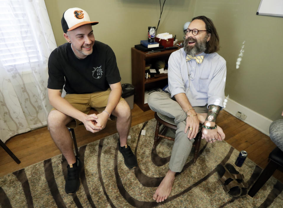 In this Oct. 8, 2018, photo, Tim Nolen, left, participates in a relapse prevention group session with counselor Bob Benson, right, at a treatment facility run by Buffalo Valley Inc. in Nashville, Tenn. Nolen has no health insurance coverage and his treatment for opioid addiction is funded by a grant program Congress approved in 2016 under the 21st Century Cures Act. (AP Photo/Mark Humphrey)