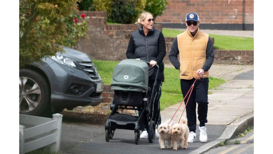 Ant and Anne Marie were pictured pushing a pram on a walk with Wilder and their two dogs