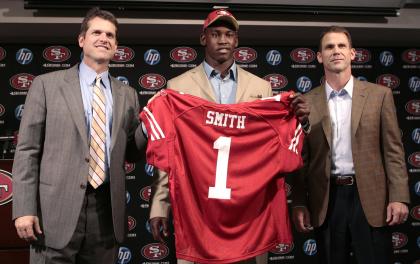 Reported conflict between Jim Harbaugh (L) and GM Trent Baalke (R) is expected to lead to a breakup. (AP) 