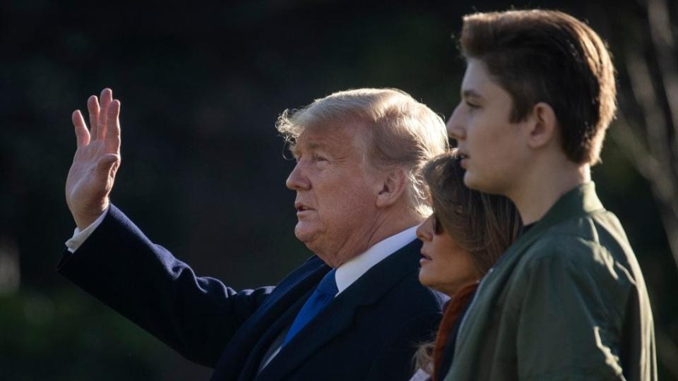 Headed to Mar-a-Lago for the weekend, President Donald Trump, First Lady Melania Trump and Barron Trump walk across the South Lawn toward Marine One at the White House in this January photo. (Photo by Drew Angerer/Getty Images)