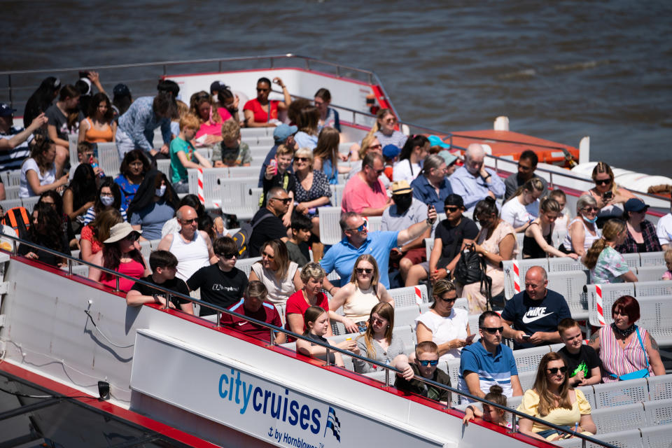 <p>Tourists enjoy the good weather on a City Cruises boat on the River Thames, London. Picture date: Thursday June 3, 2021.</p>
